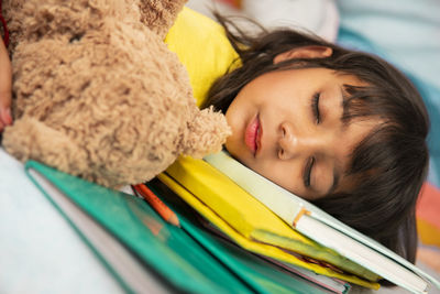 Portrait of girl sleeping at home