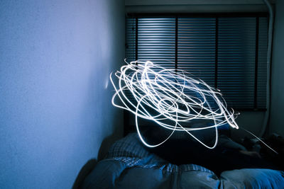 Light painting over bed at home