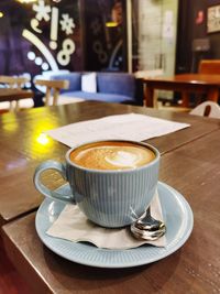 Coffee cup on table