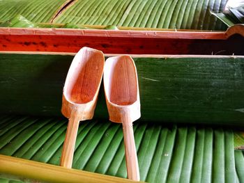 Close-up of wooden ladles