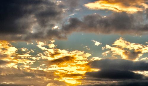 Low angle view of clouds in sky during sunset