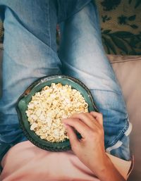 Low section of person holding food