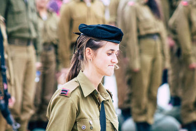 Portrait of young woman looking away