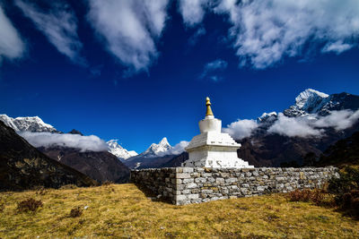 Scenic view of snowcapped mountains against sky