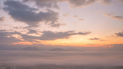 Low angle view of dramatic sky during sunset