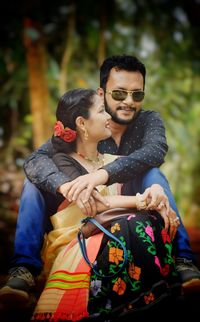 Man and woman wearing mask