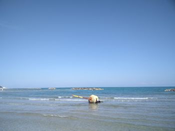 Scenic view of sea against clear sky