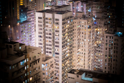 Aerial view of illuminated buildings in city