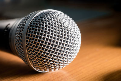 Close-up of microphone on table