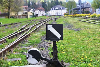 Railroad tracks by grass