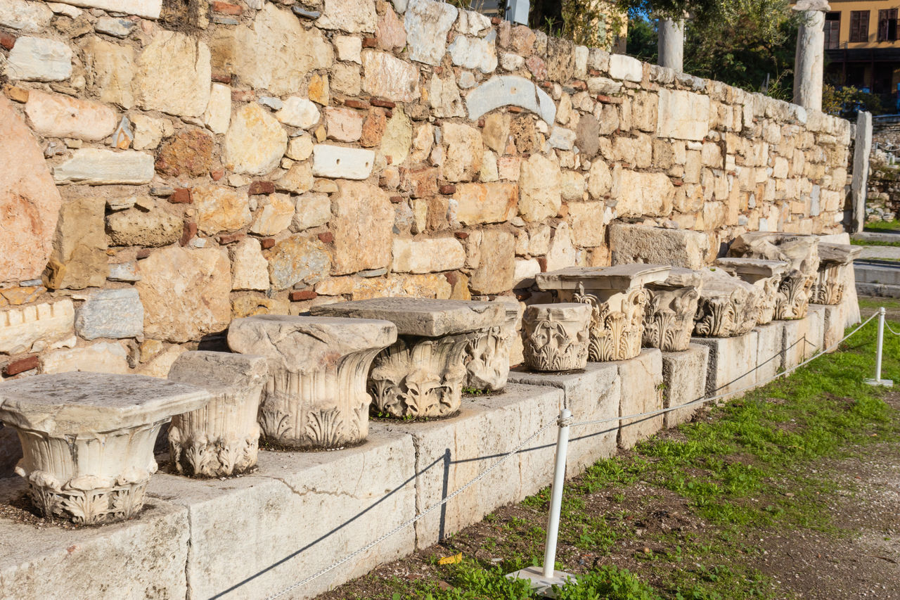 VIEW OF STONE WALL IN A ROW