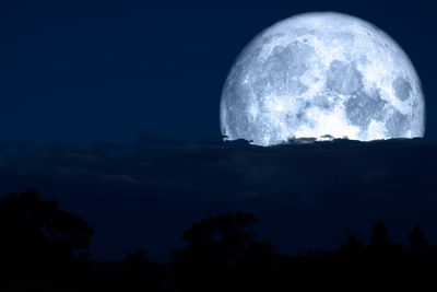 Scenic view of moon against sky at night