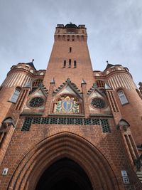 Low angle view of historic building against sky