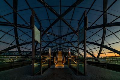 Illuminated bridge against sky