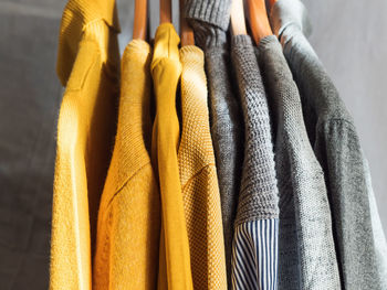 Close-up of clothes hanging on display at store