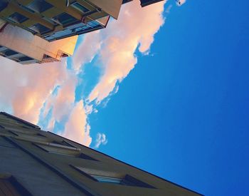 Low angle view of built structure against blue sky