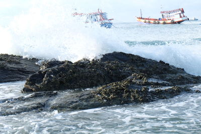 Scenic view of waves in sea