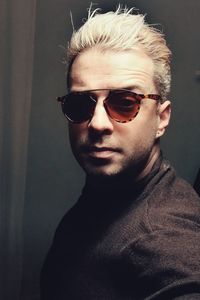 Portrait of mid adult man wearing sunglasses