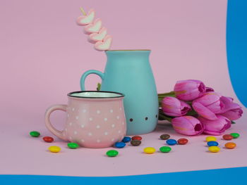 Close-up of pink flower on table