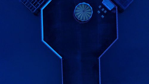 Low angle view of illuminated built structure at night