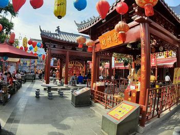 Lanterns hanging outside building in city