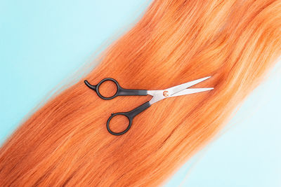 Close-up of woman against white background