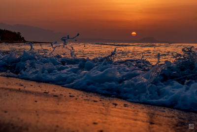 Scenic view of sea against sky during sunset