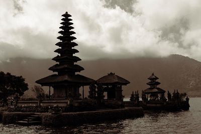 View of temple against cloudy sky