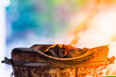 Close-up of bonfire against sky