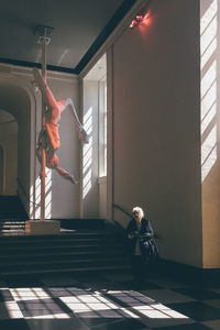 Senior woman standing in museum