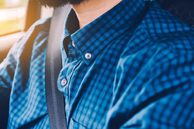 Close-up of man in car