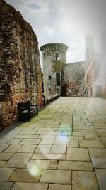 Footpath leading to stone wall