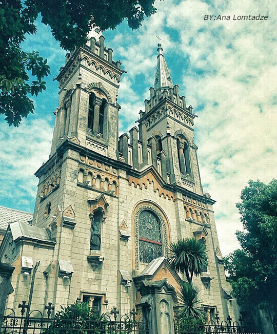 sky, architecture, building exterior, built structure, travel, travel destinations, no people, religion, outdoors, low angle view, day, place of worship, tree, clock