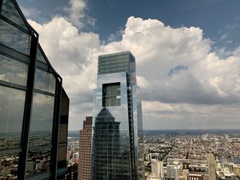 Modern buildings in city against sky