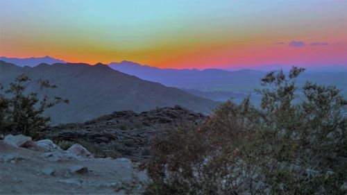 Scenic view of mountains against sky during sunset