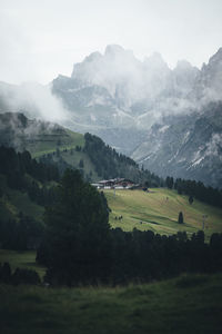 Scenic view of landscape and mountains against sky