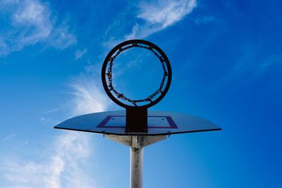 Basketball hoop and blue sky in the street