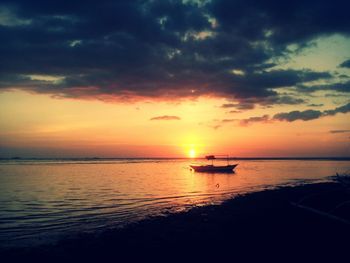 Scenic view of sea at sunset