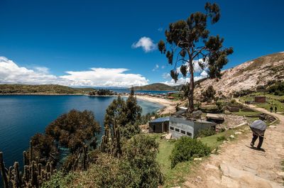 Scenic view of sea against blue sky