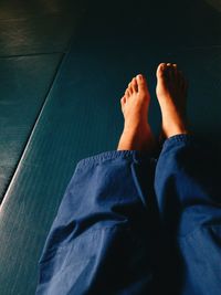 Low section of person on tatami mat