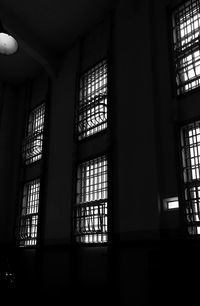 Low angle view of glass window in building