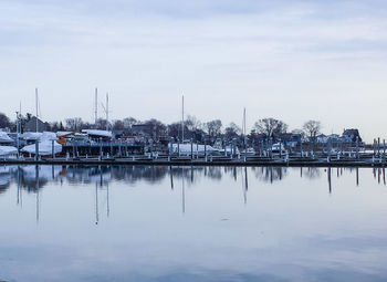 Boats moored at harbor