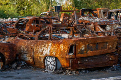 Old rusty car on land