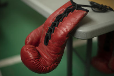 Cropped hand of woman with boxing gloves