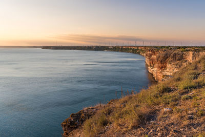 Scenic view of sea against sky during sunset