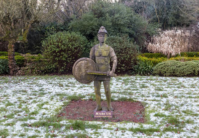 Statue of man in park