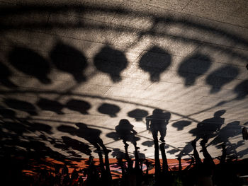 Upside down image of people walking in street