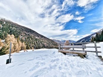 Scenic view of snowcapped mountains against sky