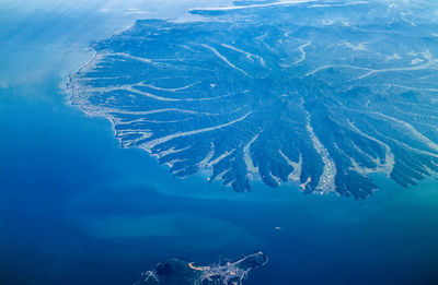 Scenic view of sea against blue sky