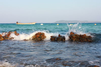 Scenic view of sea against clear sky